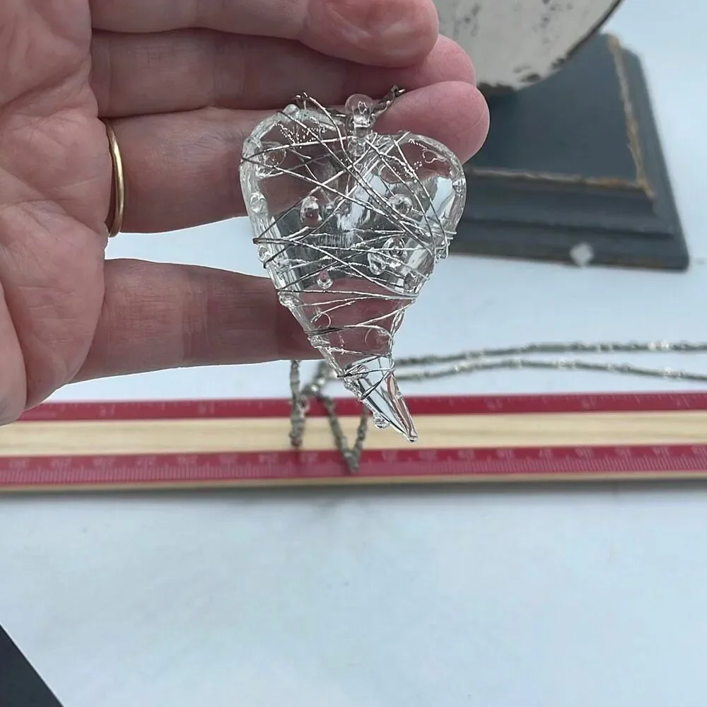Stylized wire wrapped heart glass pendant vintage chain with spring clasp.